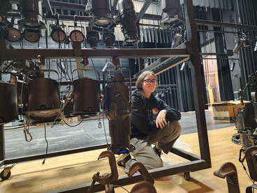 Student helping in auditorium